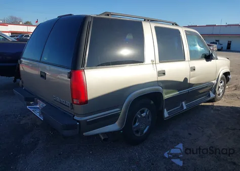 1999 Chevrolet Tahoe Lt from USA, damaged, VIN 1GNEC13R3XJ464697